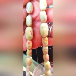 Vintage 1950's conch striated genuine pearls, pink, green,red,brown